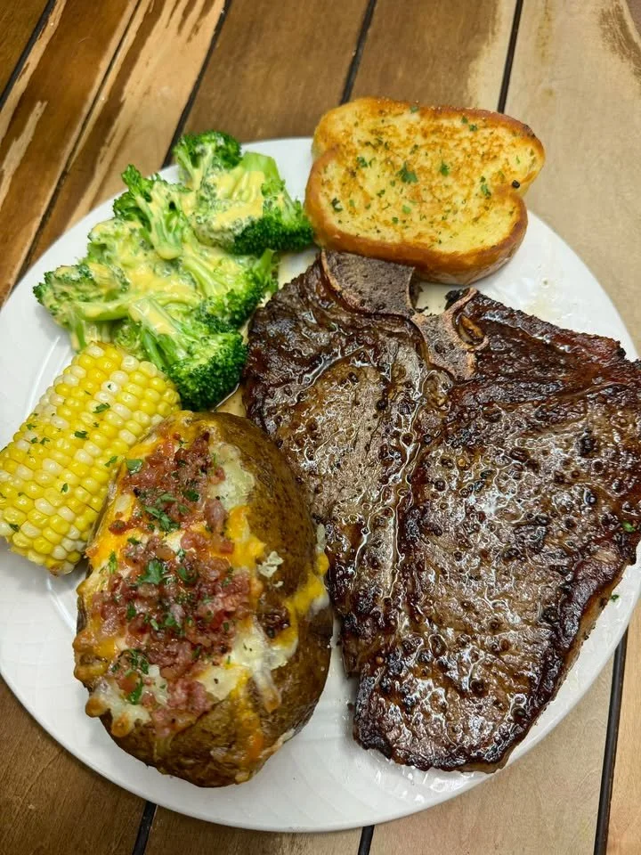 Big juicy T-bone, loaded baked potato, cheesy broccoli, corn and garlic bread 🔥🔥🔥