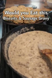Plate of biscuits topped with creamy sausage gravy