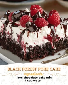 Delicious Black Forest Poke Cake topped with cherries and whipped cream