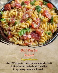 Delicious BLT Pasta Salad with bacon, lettuce, and tomatoes in a creamy dressing.