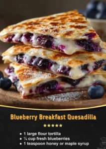 Blueberry breakfast quesadilla filled with cream cheese and fresh blueberries