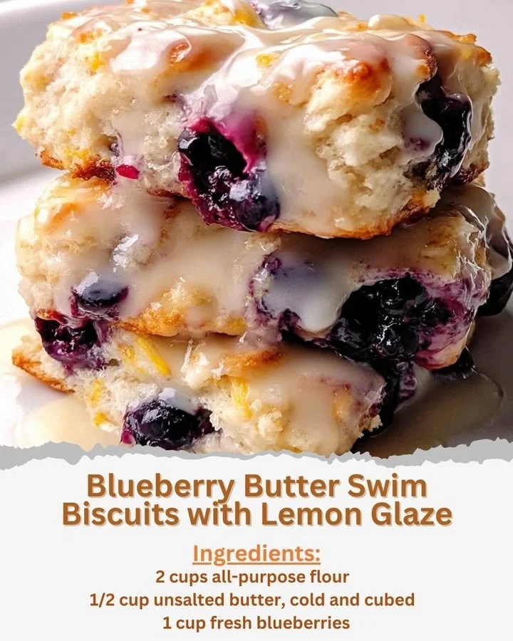 Blueberry Butter Swim Biscuits drizzled with lemon glaze on a plate