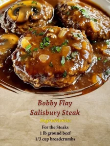 Bobby Flay's Salisbury steak served with gravy and vegetables