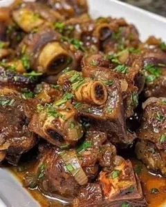 Mouthwatering braised oxtail simmering in rich sauce