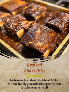 Deliciously cooked braised short ribs garnished with herbs and served on a plate.