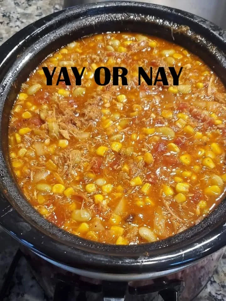 A bowl of Brunswick Stew with vegetables and meat, showcasing its hearty texture and color.