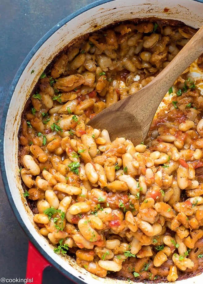 Bowl of Bulgarian Baked Beans with herbs and spices.