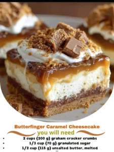 Delicious Butterfinger Caramel Cheesecake topped with caramel and chocolate.