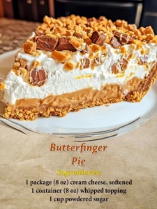 Delicious no-bake Butterfinger Pie topped with crushed Butterfinger candy