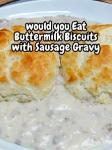 Flaky buttermilk biscuits topped with creamy sausage gravy