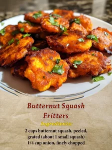 Plate of crispy butternut squash fritters with dipping sauce