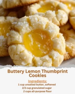 Buttery lemon thumbprint cookies topped with lemon glaze and zest
