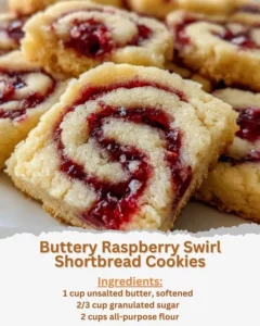 Freshly baked raspberry swirl shortbread cookies on a plate