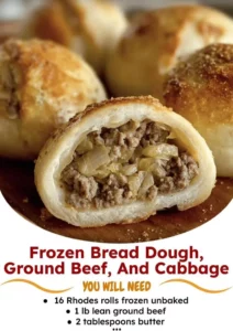 Cabbage rolls filled with beef and topped with tomato sauce