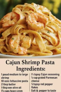 Plate of spicy Cajun Shrimp Pasta garnished with herbs