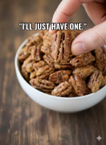 A bowl of sweet and crunchy candied pecans ready to be enjoyed.