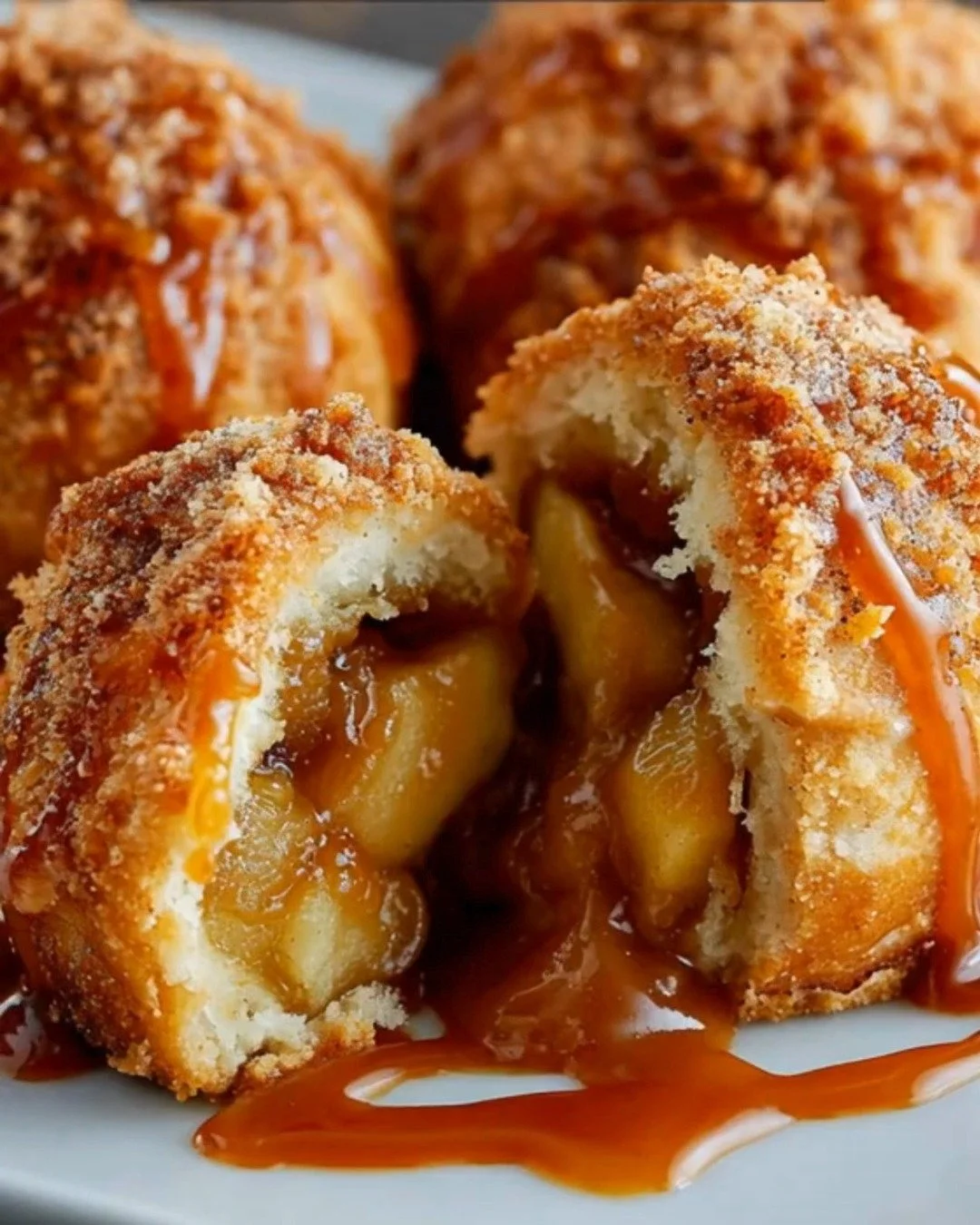 Caramel Apple Bombs dessert featuring apples dipped in caramel