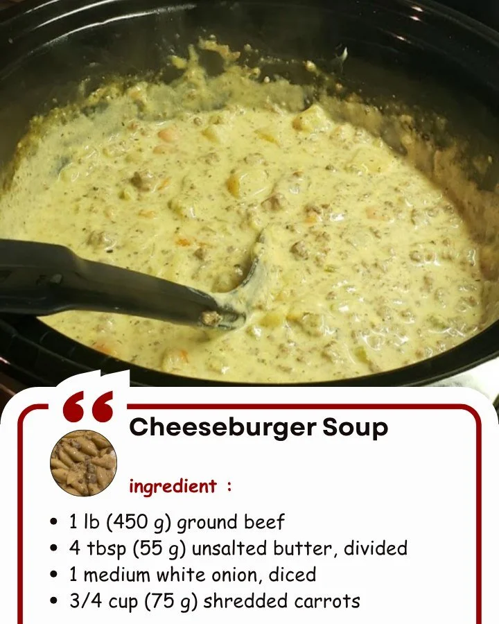 Bowl of rich cheeseburger soup topped with cheese and herbs