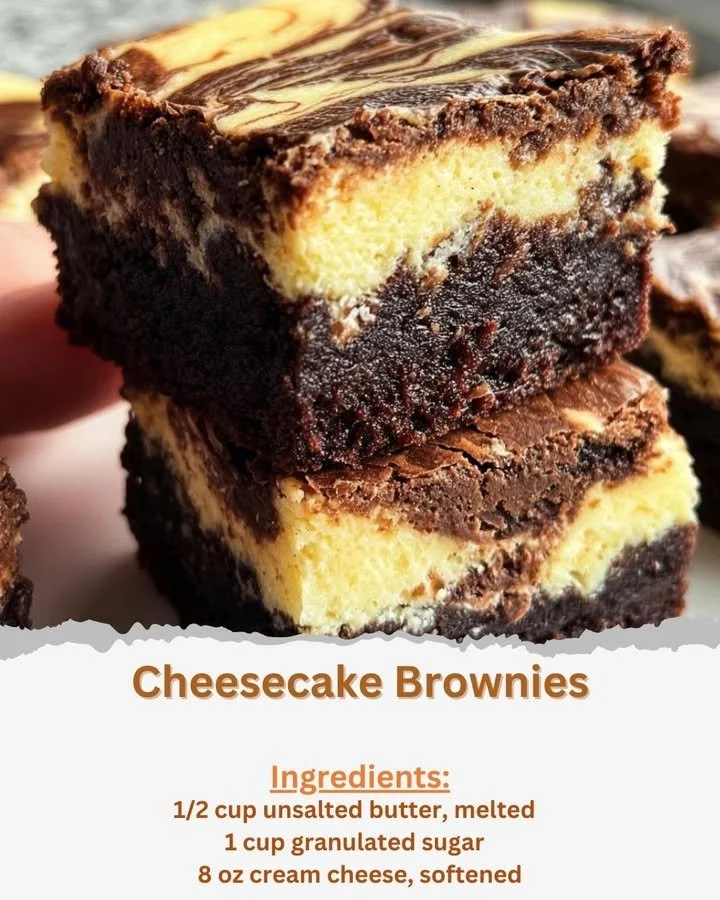 Fudgy cheesecake brownies topped with creamy cheesecake swirl.