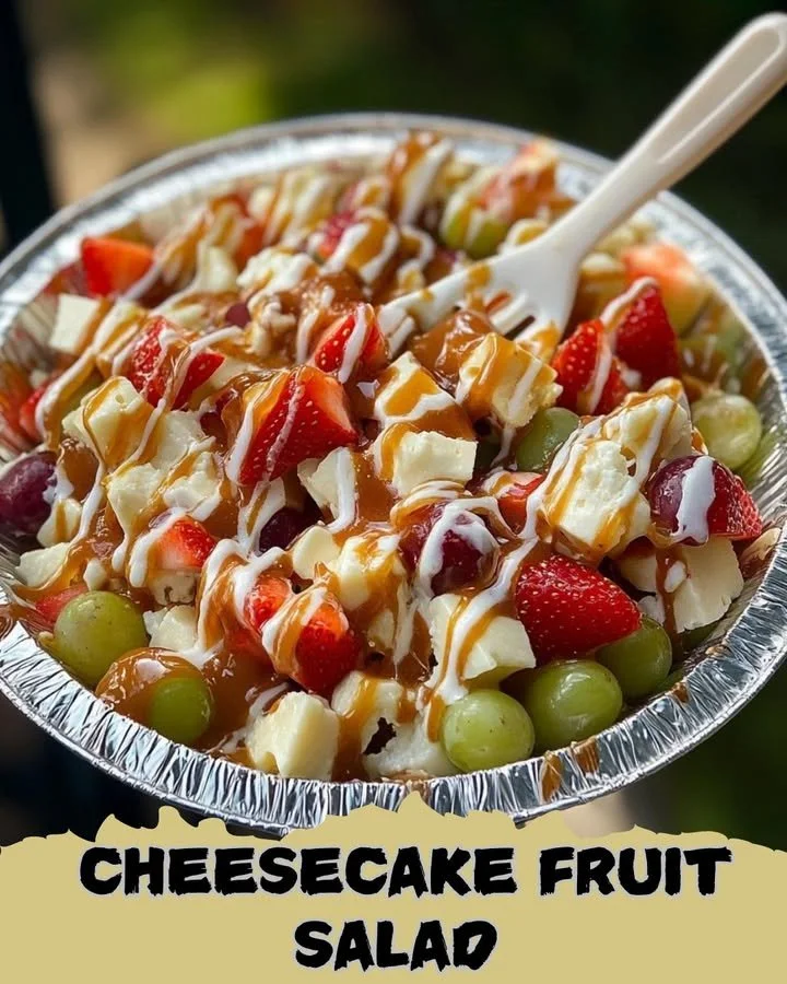Delicious cheesecake fruit salad with colorful fresh fruits and creamy topping