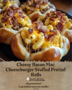 Cheesy Bacon Mac Cheeseburger Stuffed Pretzel Rolls with melted cheese and bacon
