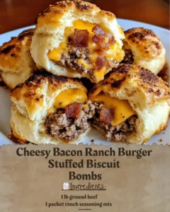 Cheesy bacon ranch burger stuffed biscuit bombs on a plate