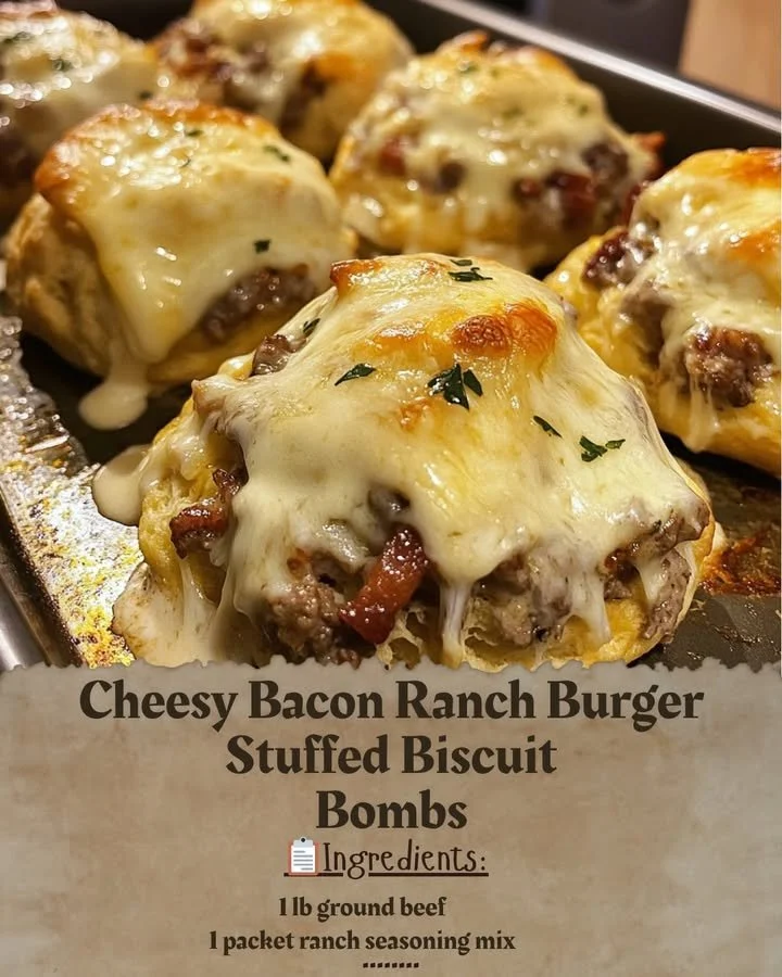 Cheesy Bacon Ranch Burger Stuffed Biscuit Bombs with melted cheese and crispy bacon