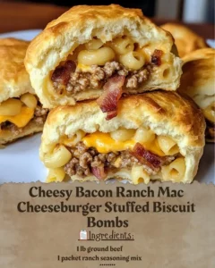 Cheesy bacon ranch cheeseburger stuffed biscuit bombs on a serving plate