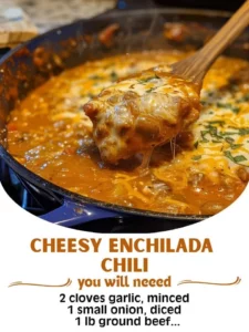 Bowl of cheesy enchilada chili topped with cheese and herbs