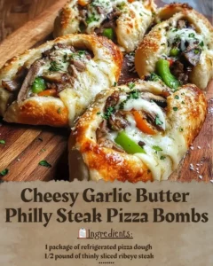 Cheesy Garlic Butter Philly Steak Pizza Bombs fresh out of the oven