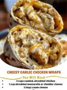 Cheesy garlic chicken wraps with fresh ingredients wrapped in a tortilla