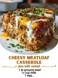 Cheesy meatloaf casserole served in a baking dish with melted cheese on top.