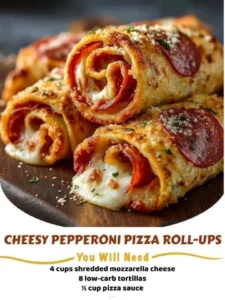 Cheesy pepperoni pizza roll-ups served on a plate