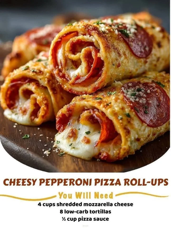 Cheesy pepperoni pizza roll-ups served on a plate