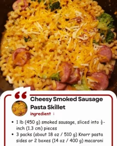 Cheesy Smoked Sausage Pasta Skillet dish topped with parsley in a skillet