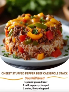 Cheesy stuffed pepper beef casserole with melted cheese and colorful peppers
