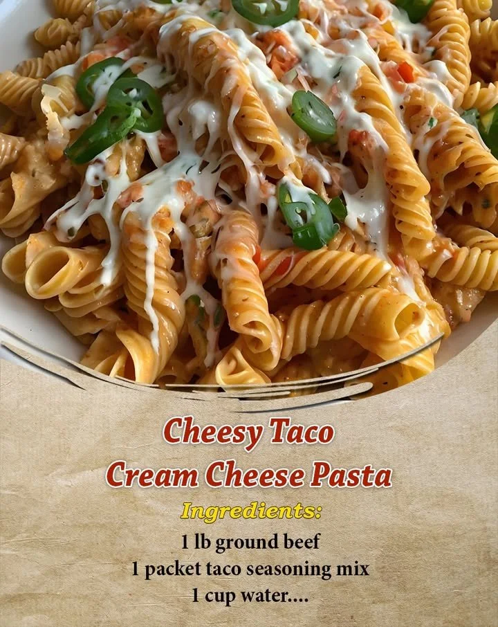 Delicious Cheesy Taco Cream Cheese Pasta dish topped with herbs