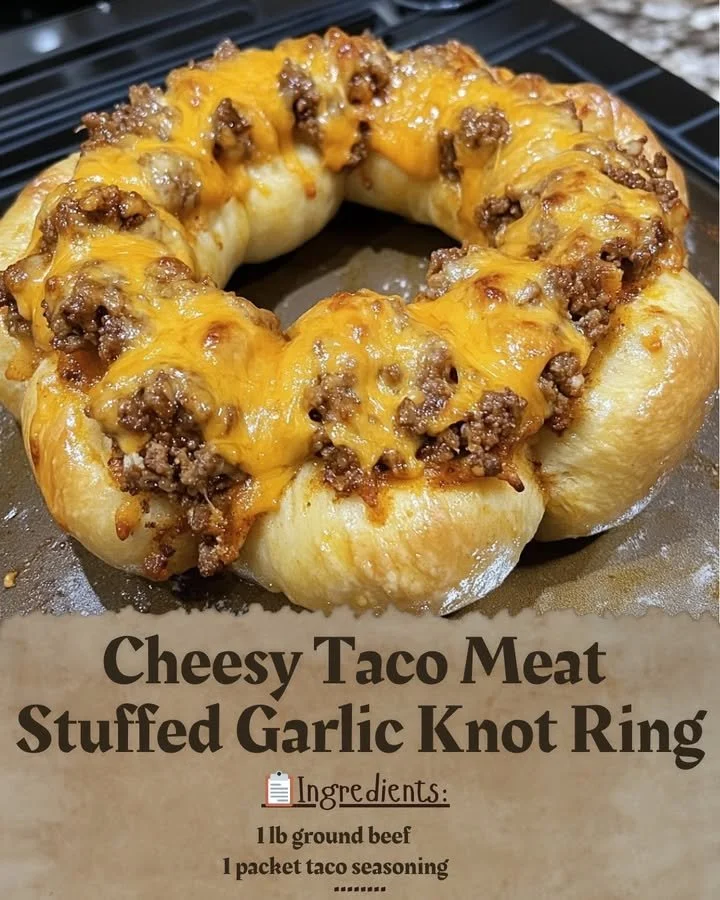 Cheesy taco meat stuffed in a garlic knot ring, a delicious party dish.