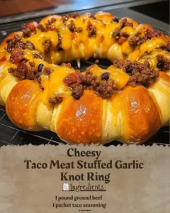 Cheesy Taco Meat Stuffed Garlic Knot Ring baked with savory garlic knots and taco meat.