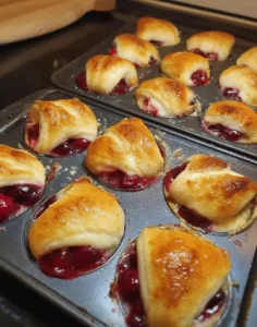 Delicious cherry pie crescent rolls on a plate