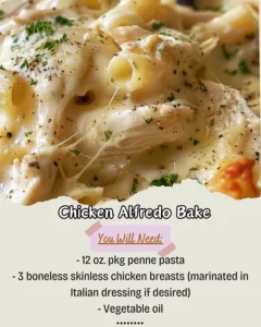 Creamy Chicken Alfredo Bake topped with melted cheese and herbs