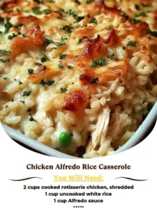 Creamy Chicken Alfredo Rice Casserole topped with cheese and herbs