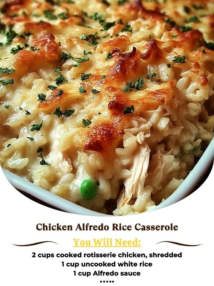 Creamy Chicken Alfredo Rice Casserole topped with cheese and herbs
