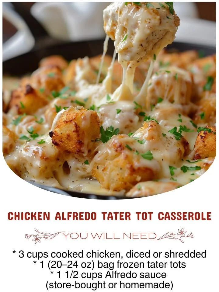 Chicken Alfredo Tater Tot Casserole topped with cheese and crispy tater tots.