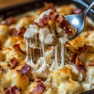 Delicious Chicken Bacon Crunch Casserole topped with crunchy bacon and cheese