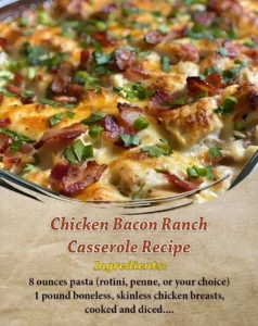 Creamy Chicken Bacon Ranch Casserole topped with cheese and crispy bacon