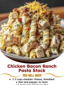 Delicious Chicken Bacon Ranch Pasta topped with crispy bacon and fresh herbs