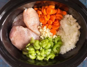 Delicious homemade Chicken Noodle Soup in a bowl with fresh herbs.