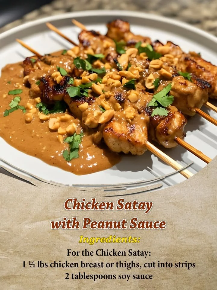 Delicious chicken satay skewers with creamy peanut sauce on a plate