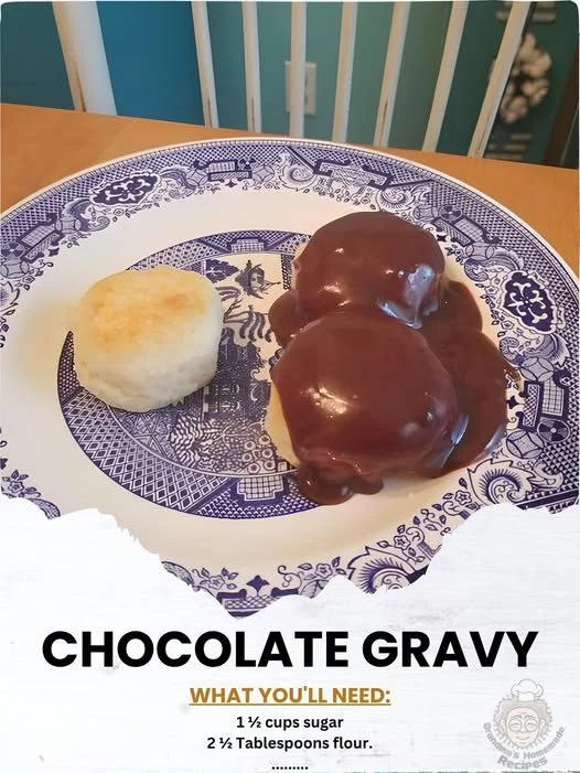 Delicious chocolate gravy served over biscuits, a sweet indulgence.